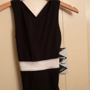 Women’s fitted tank / back crisscross out